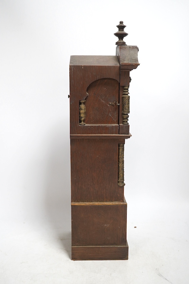 A miniature longcase clock and a miniature yew cylinder musical box, largest 42cm high. Condition - box poor, clock good